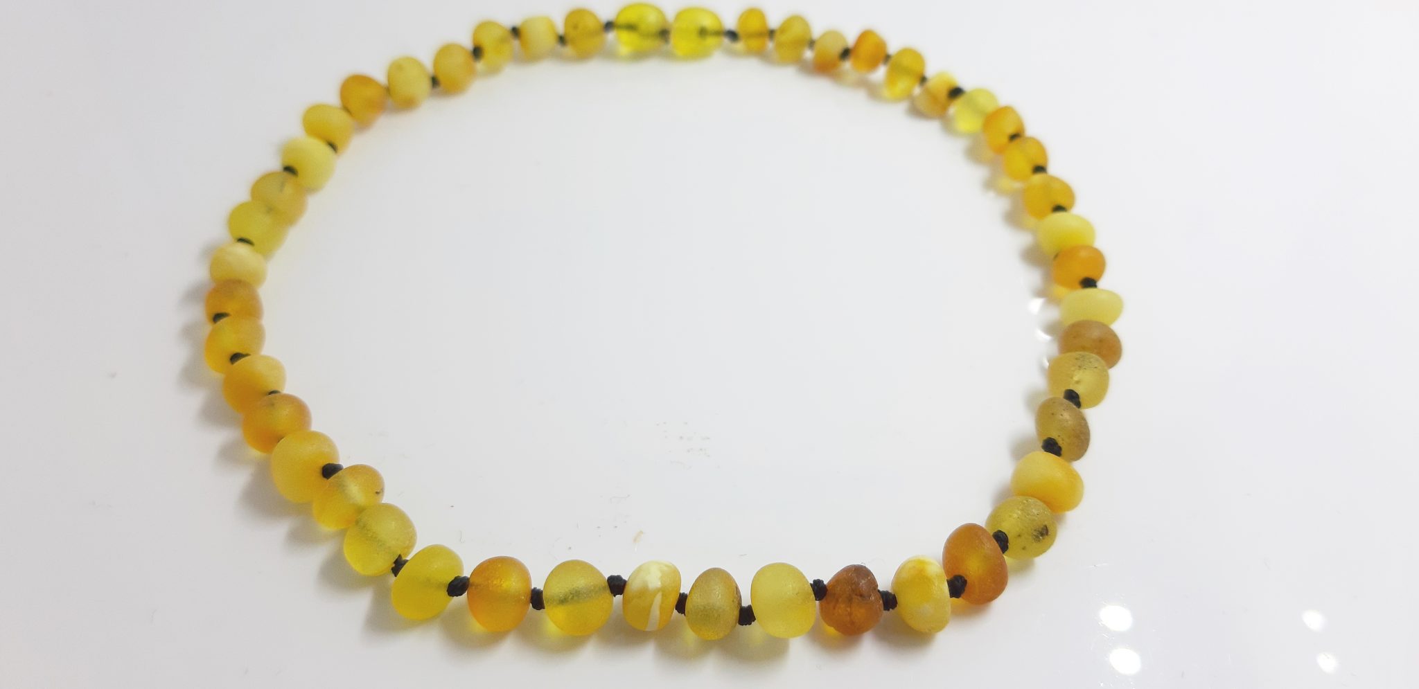 Vaikiški gintariniai karoliai nepoliruotas