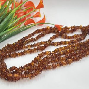 Baltijos gintaro ilgi karoliai